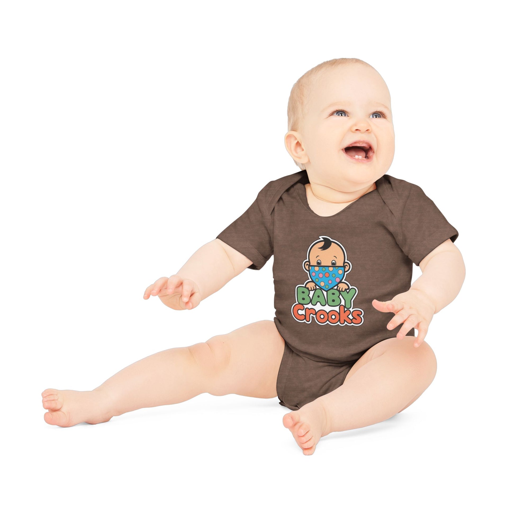 Baby wearing a brown onesie with 'Baby Crooks' print on a white background